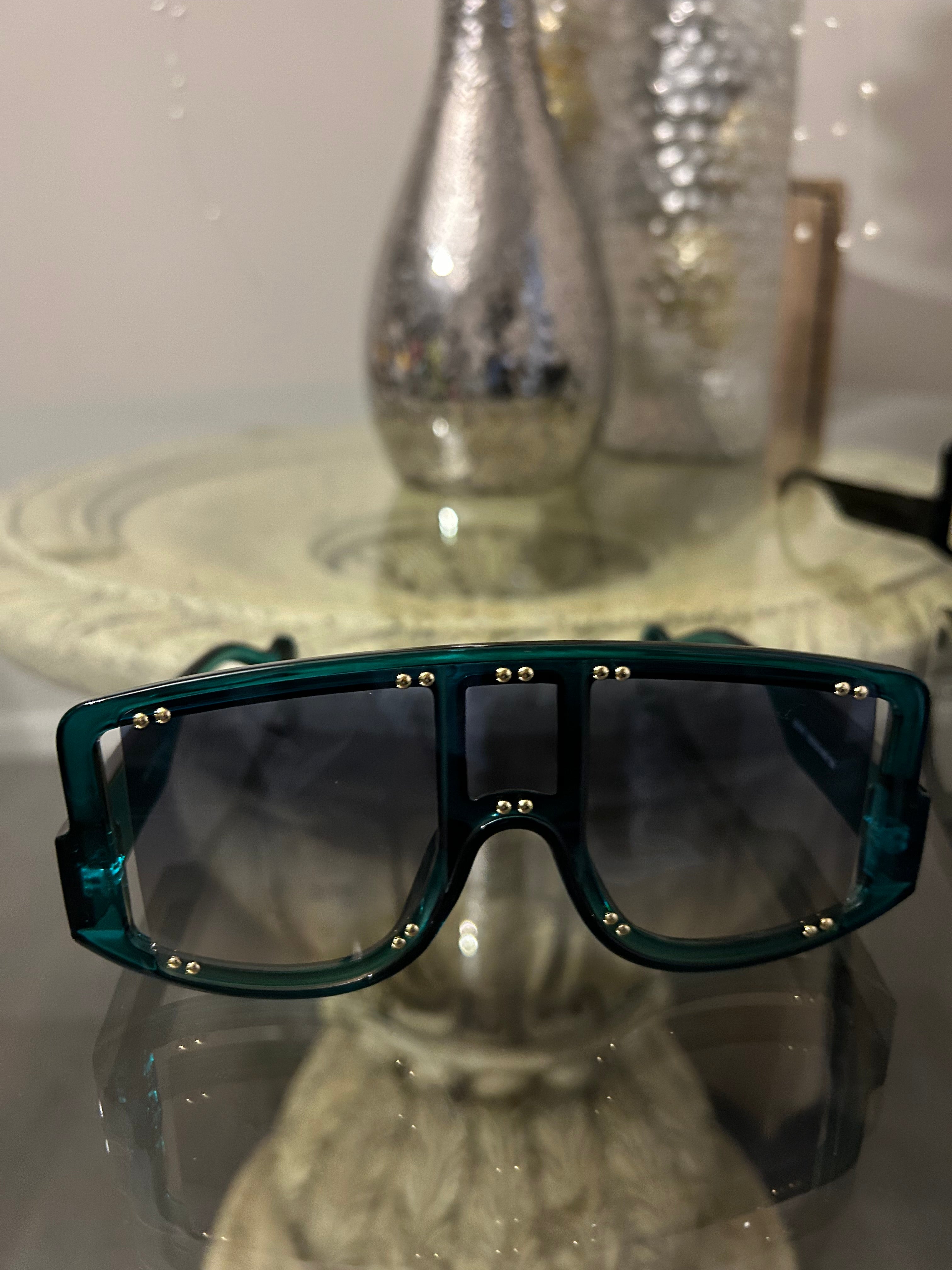 Sophisticated, worldly, and effortlessly chic. teal glasses with bead details 