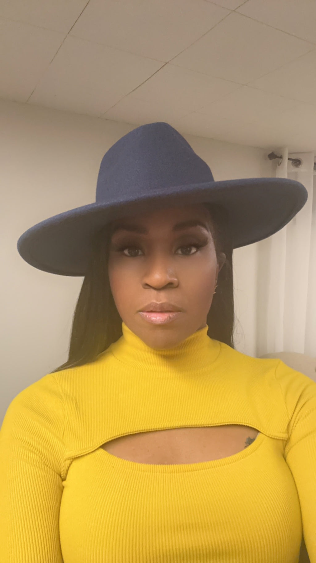 lady in a Navy-blue fedora  