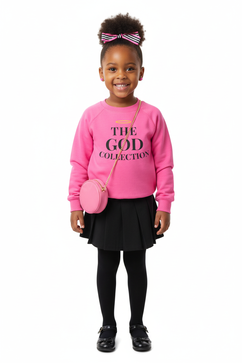 Little girl wearing The God Collection sweatshirt with accessories